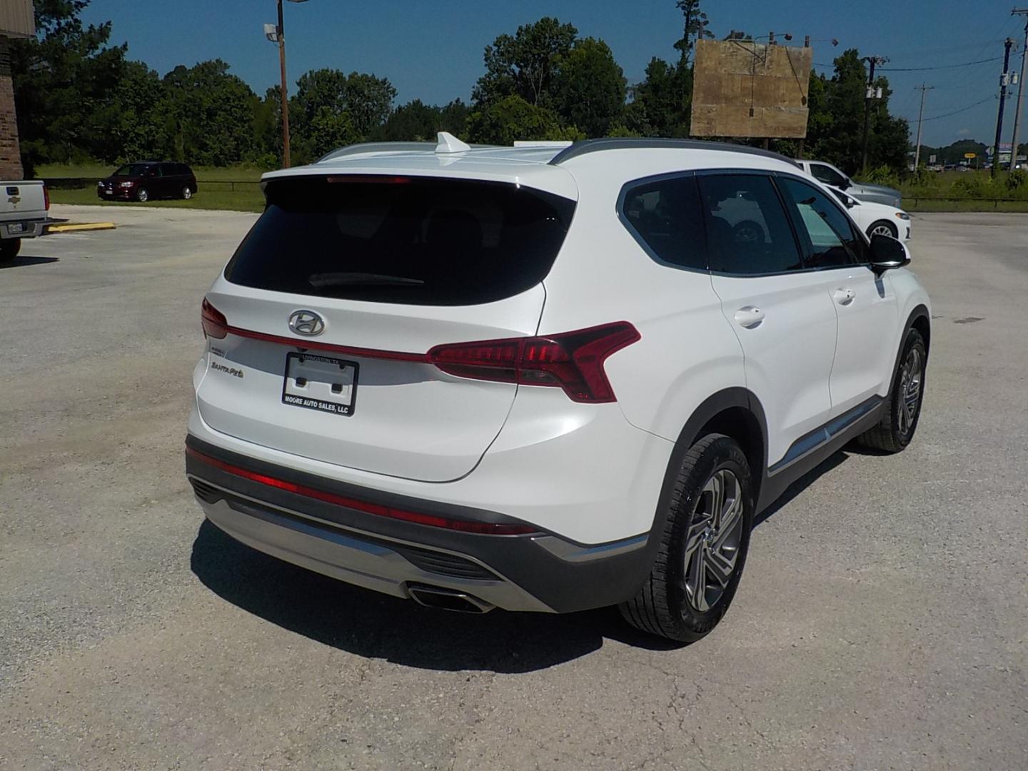 2021 White /Gray Hyundai Santa Fe (5NMS24AJ1MH) , Automatic transmission, located at 1617 W Church Street, Livingston, TX, 77351, (936) 327-3600, 30.710995, -94.951157 - ONE OWNER! Locally owned!! Really a nice unit! - Photo#6